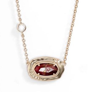 KENDRA SCOTT Anna Short Pendant Necklace Gold Bronze Veined Maroon Jade Crystals